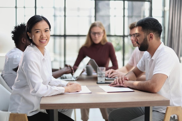 Group of happy business people in a meeting at office