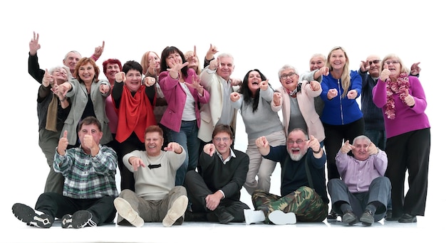 Photo group of happy mature people pointing at you