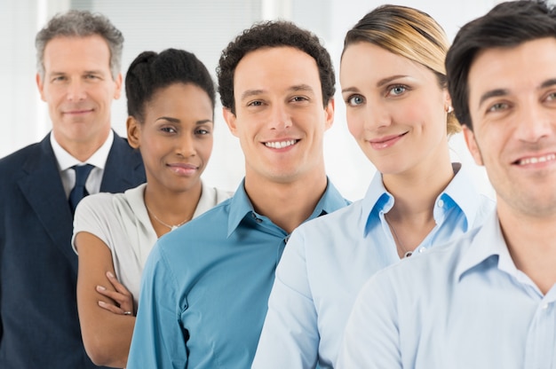 Group Of Happy Multi Multiethnic Businesspeople Looking At Camera