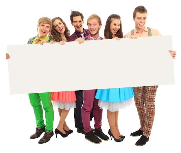 Group of happy people with banner. Isolated on white background