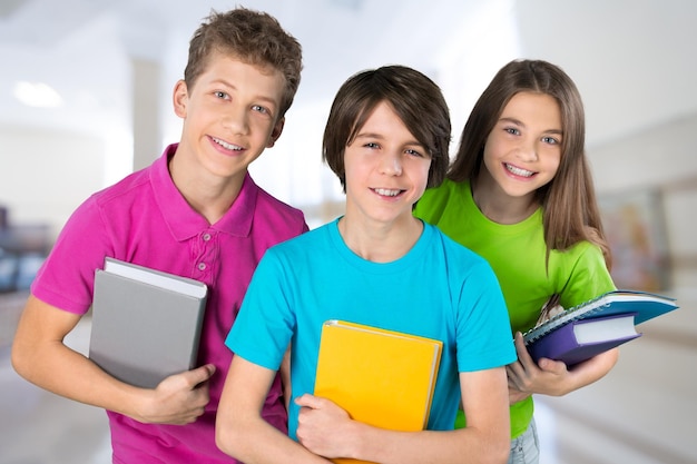 Group of happy school Students smiling at camera