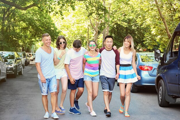 Group of happy teenagers on street