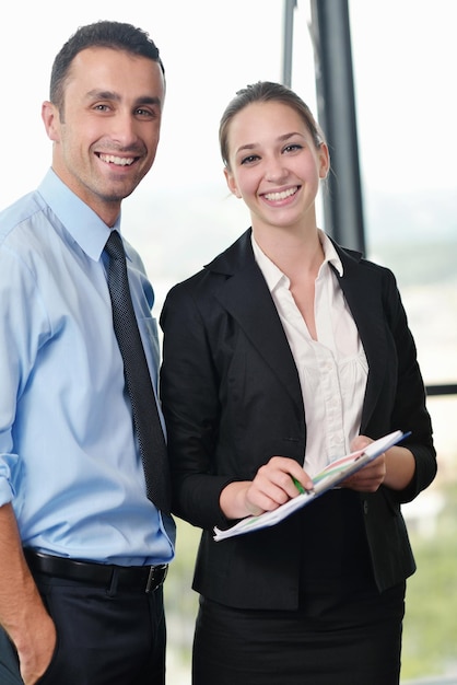 Group of happy young  business people in a meeting at office