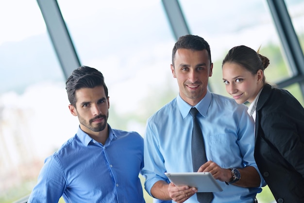 Group of happy young  business people in a meeting at office