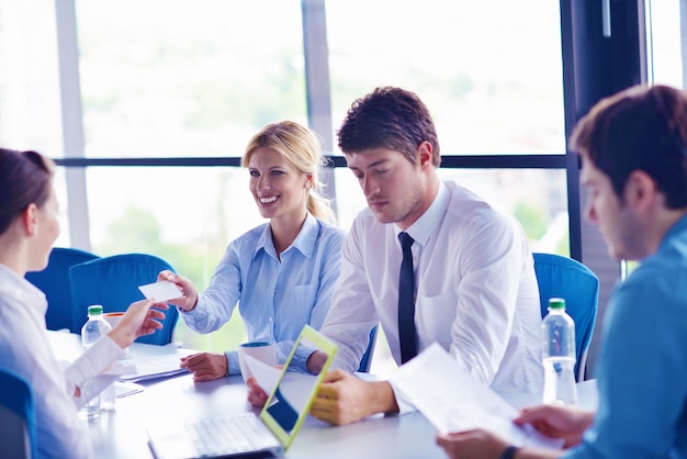 Group of happy young  business people in a meeting at office