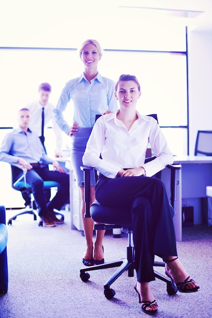 Group of happy young  business people in a meeting at office