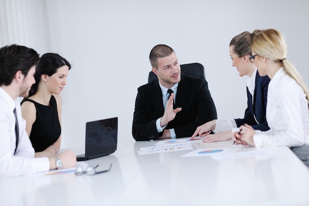 Group of happy young  business people in a meeting at office