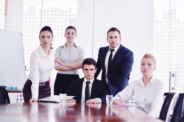 Group of happy young  business people in a meeting at office