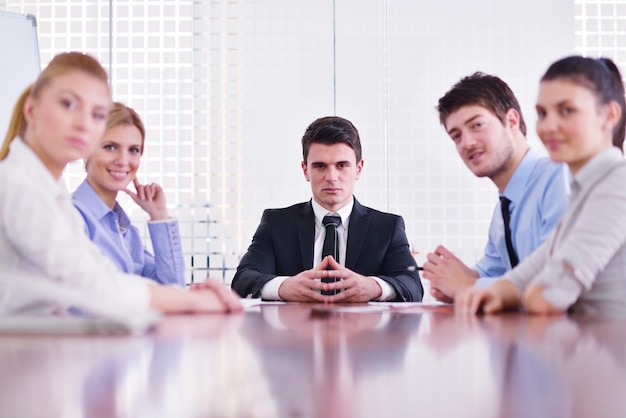 Group of happy young  business people in a meeting at office