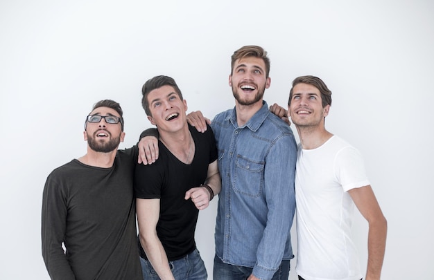 Group of happy young men looking up