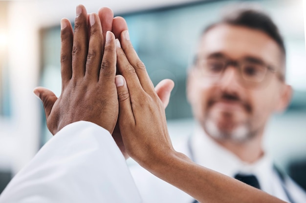 group high five diversity and hands together for teamwork support and collaboration in the workplace solidarity team building and professional friends with a goal target and mission of success