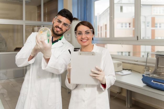 Group Of High School Students Working Together At Laboratory Class