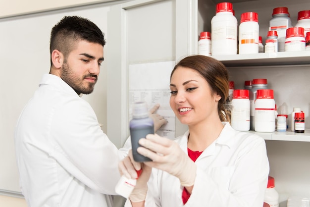 Group Of High School Students Working Together At Laboratory Class