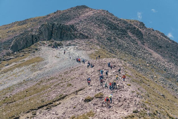 Group of hikers climbing the malinche volcano