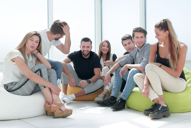 Group of initiative young people sitting in the new office