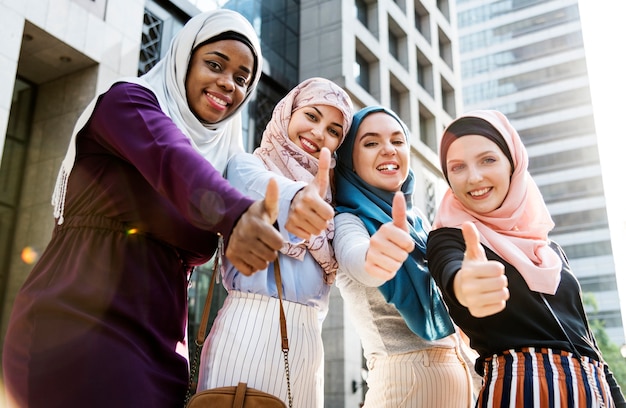 Group of islamic women gesturing thumps up