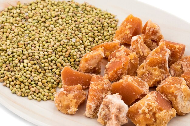 Group of jaggery with Coriander Seeds