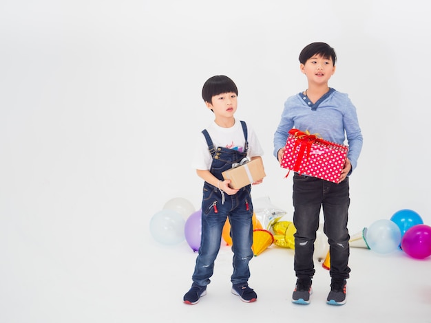 Group of kids celebrates party and enjoys christmas fun together