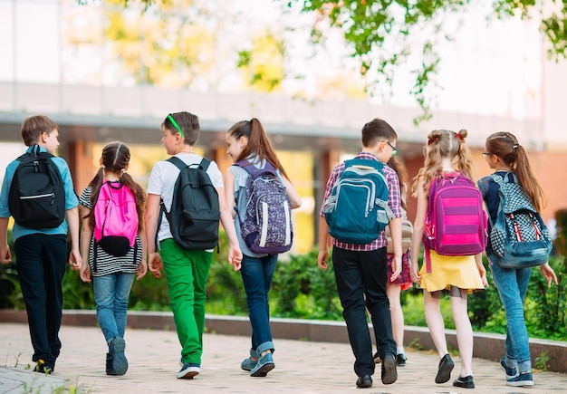 Group of kids going to school together.