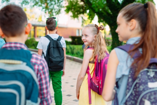 Group of kids going to school together.