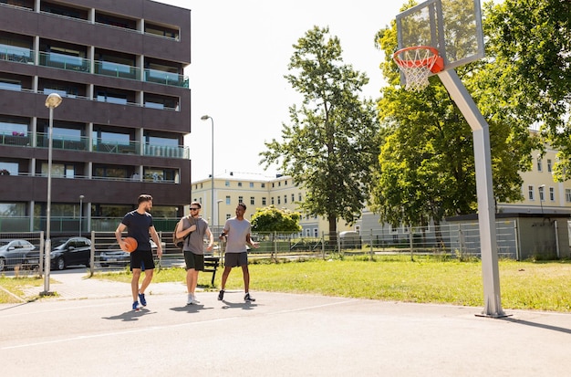 group of male friends going to play basketball