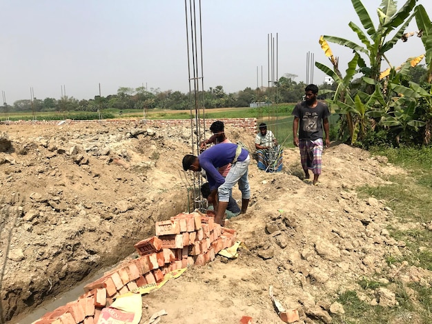 A group of men are working on a construction site.