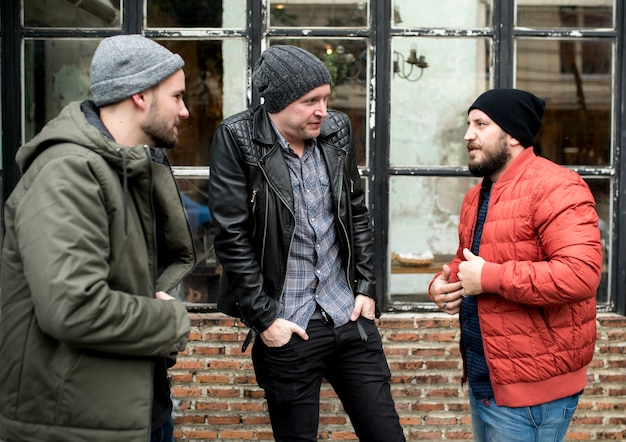 group of men discussing 