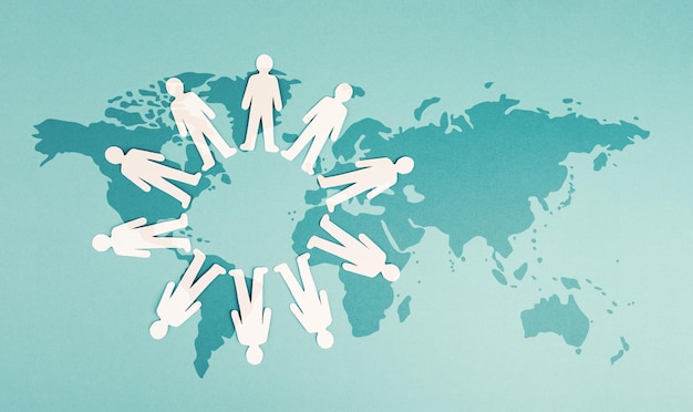 Group of men staning in a circle, on the world map, global communication, network and business