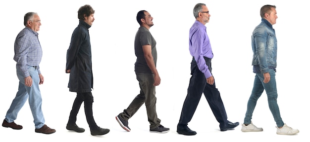 Group of men walking on white