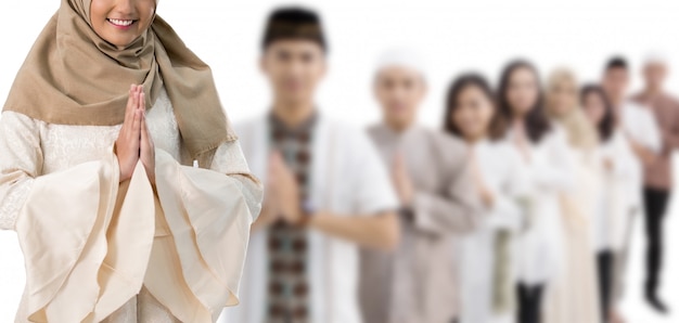 Group of men and woman praying together