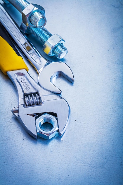 Group of metal repairing objects on metallic background construction concept