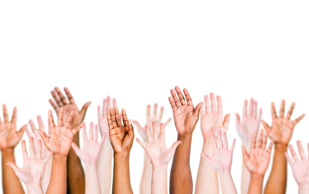 Photo group of multi-ethnic people's arms outstretched in a white background.