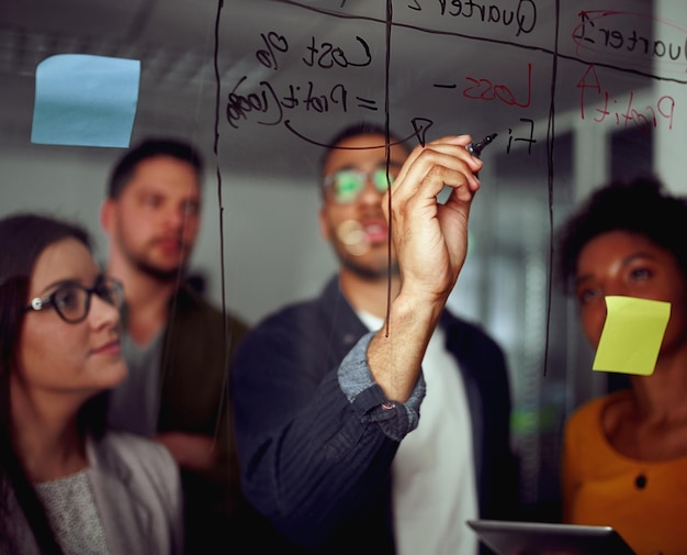group of multicultural creative employees collaborating on creating presentation