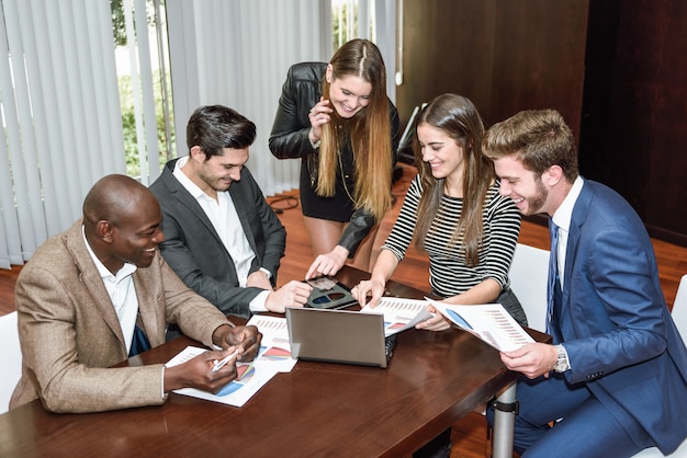 Group of multiethnic busy people working in an office