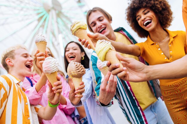 Group of multiethnics young friends having fun together