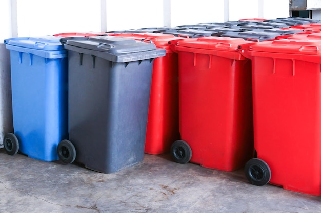 Group of new large colorful wheelie bins for rubbish, recycling waste,Large trash cans (garbage bins