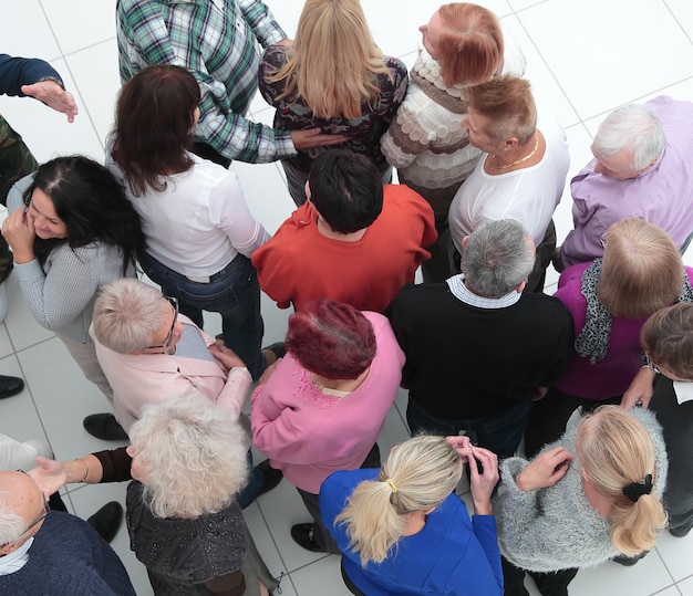 Group of older people looking in the same direction