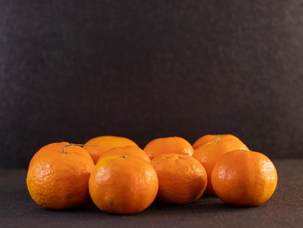 Group of oranges on black background