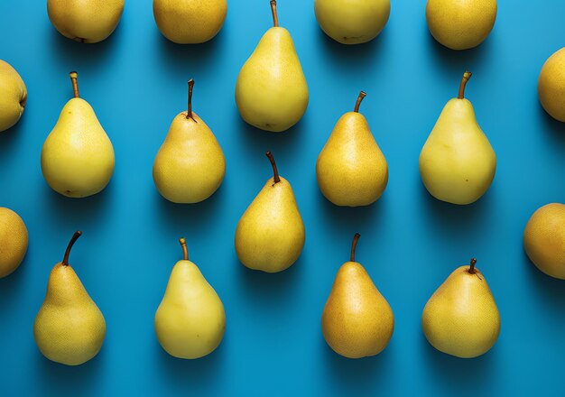 Photo a group of pears on a blue background