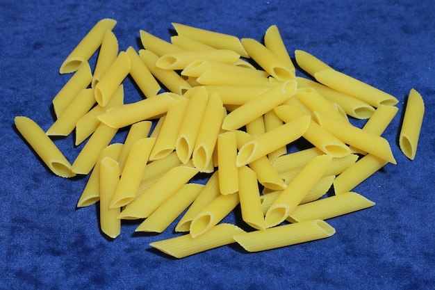 group of penne pasta raw