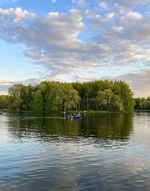 A group of people are kayaking on a lake.