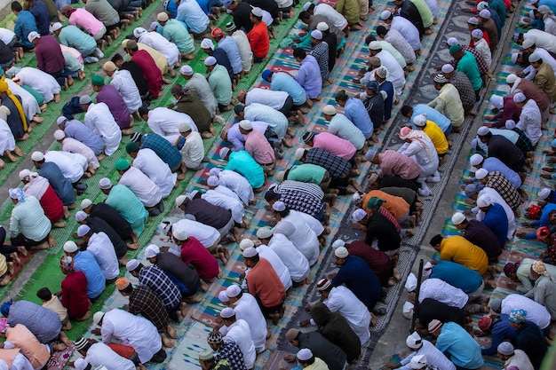 A group of people are praying in different colors and the words'islam'on it '