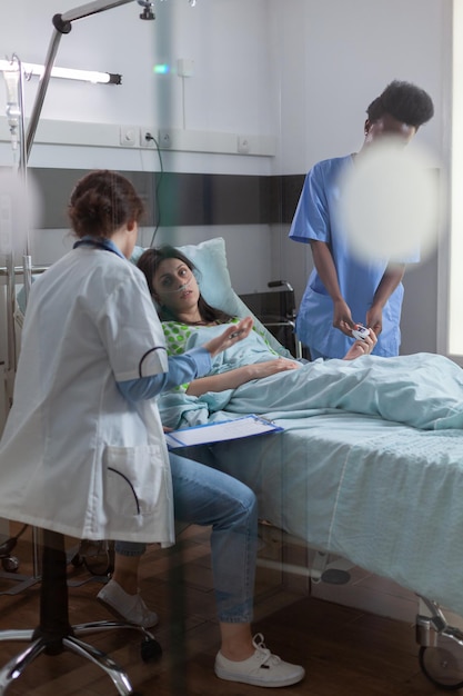group of people in bed