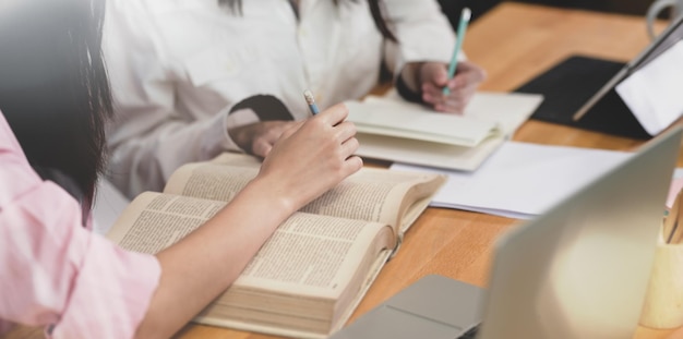 Group of people on book