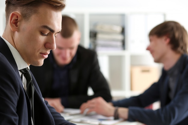 Group of people deliberate on problem