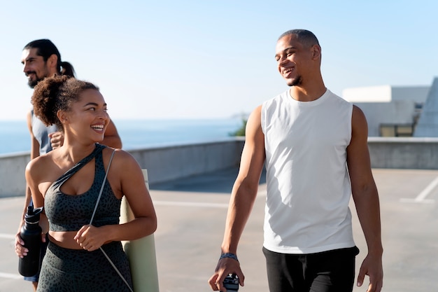 group of people exercising together outdoors