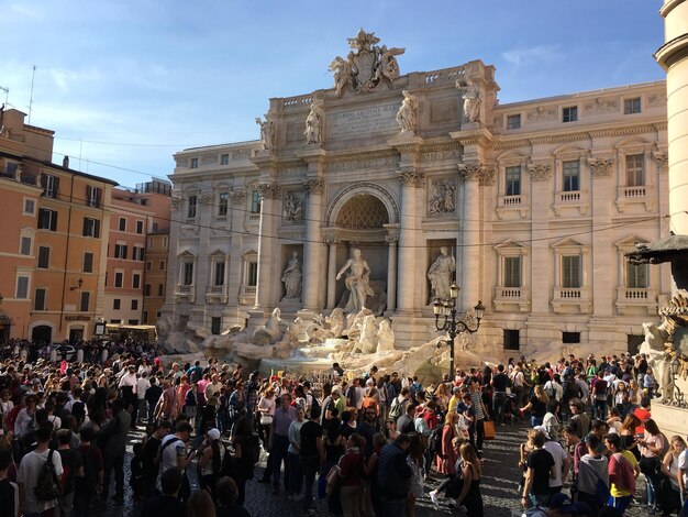 Group of people in front of historical building