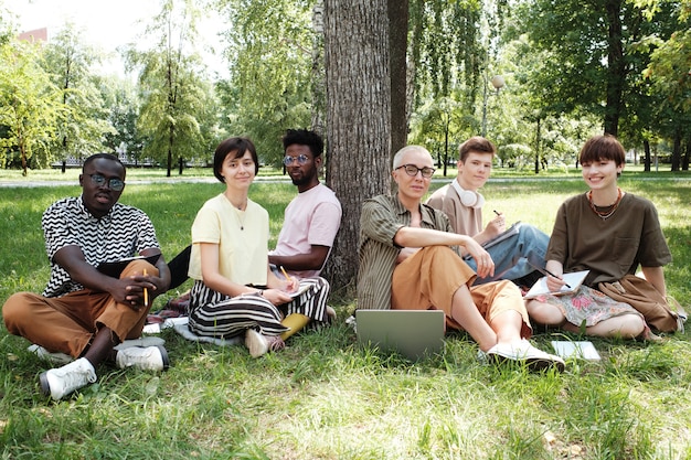 Group of people having seminar in the park