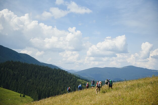 Group of people hiking in the mountains