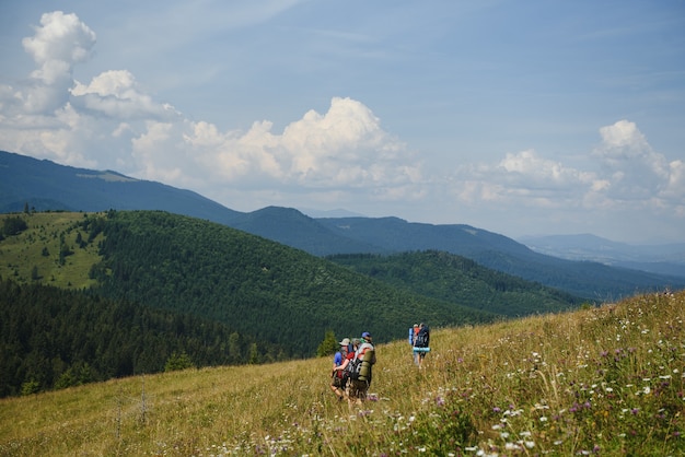 Group of people hiking in the mountains